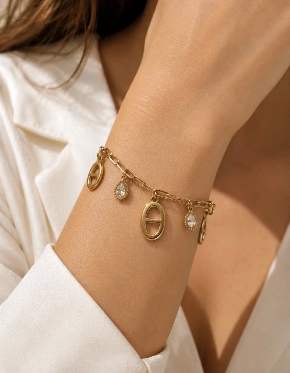 Bracelet doré à breloque
